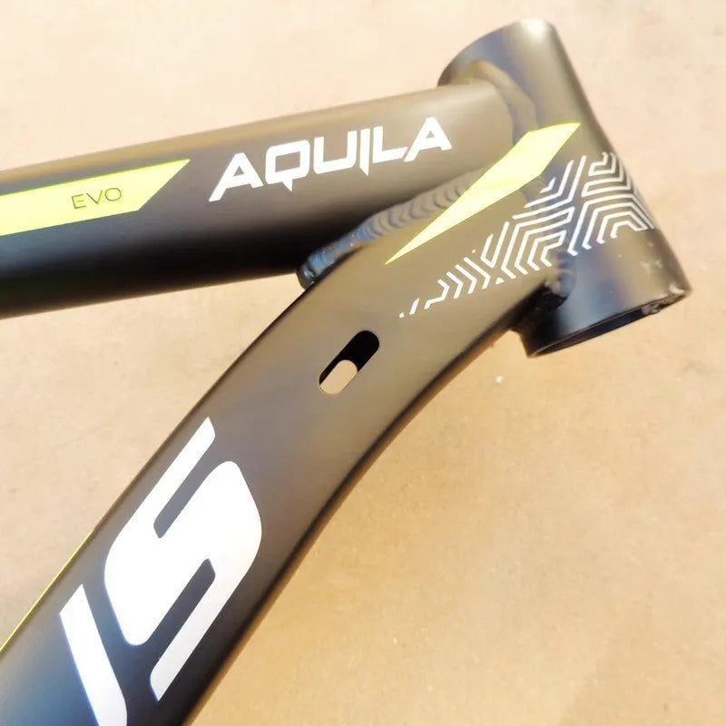 Black green 29-inch aluminium mountain bike frame showing internal cable ports and disc brake mounts
