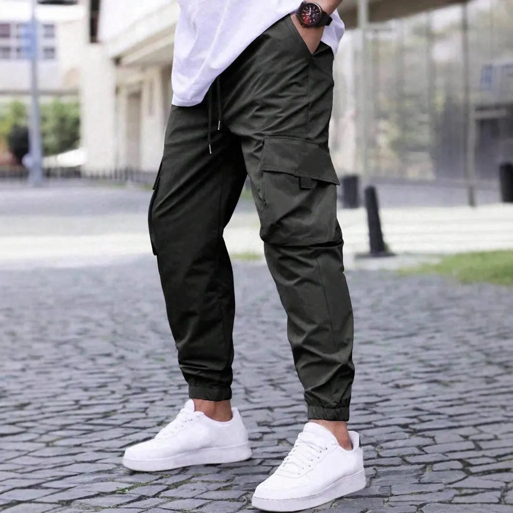 Workwear casual pants with drawstring elastic waist, solid colour, polyester fibre, skinny leg, black colour option