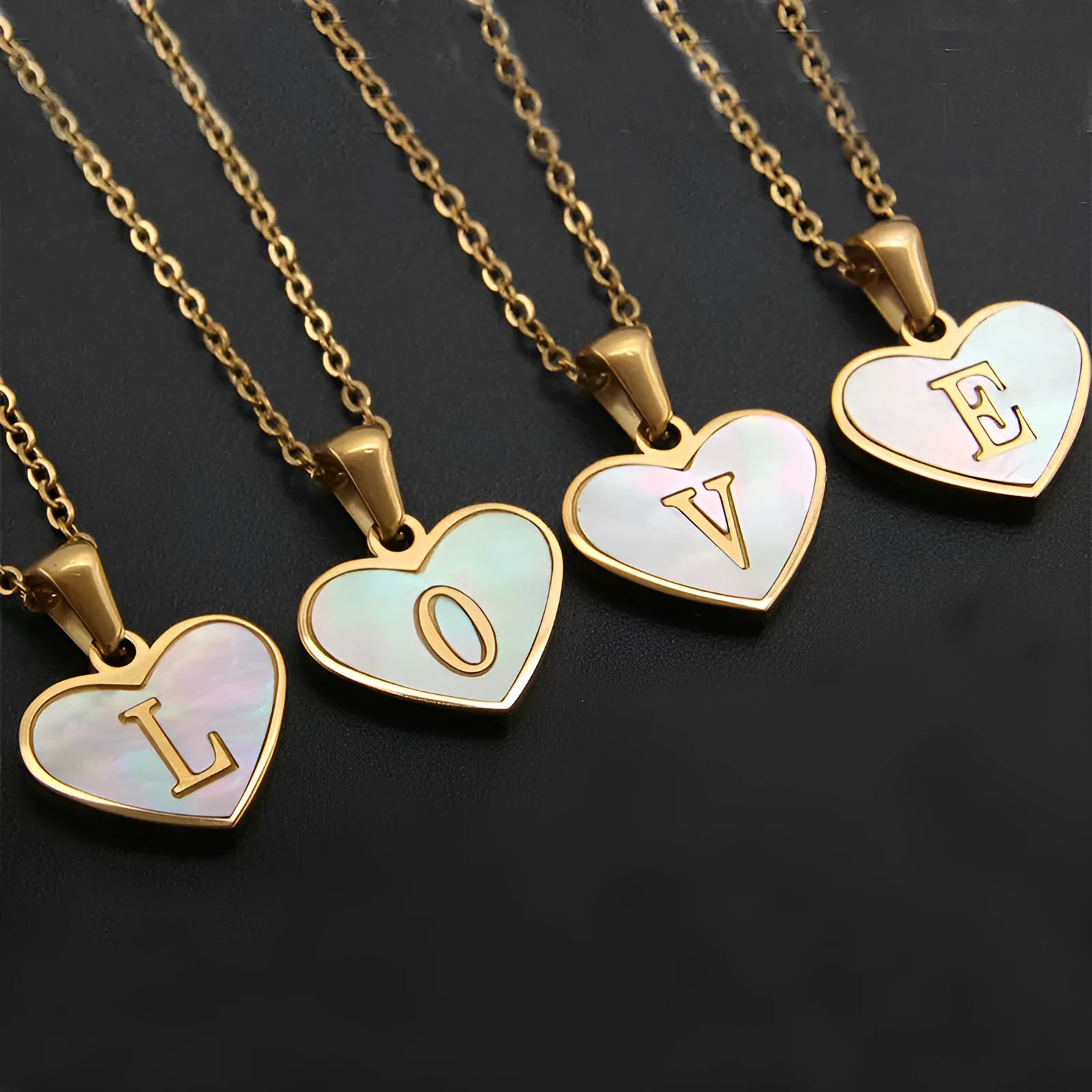 Gold-plated heart necklace with white shell design on adjustable stainless steel chain