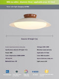 Modern minimalist cream style flying saucer ceiling lamp in mint green on a white ceiling.