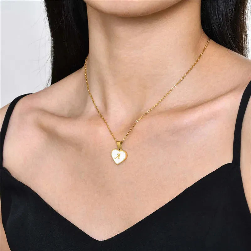 Gold-plated heart necklace with white shell design on adjustable stainless steel chain