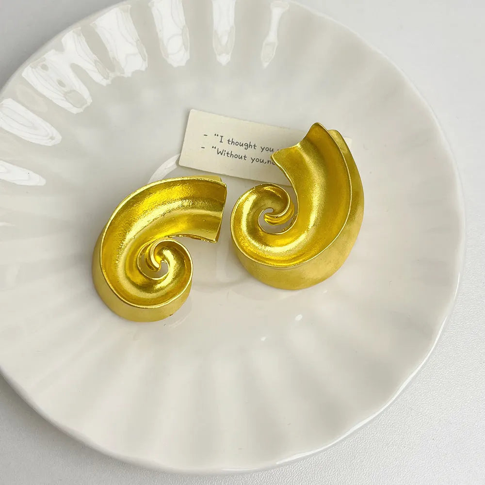 Geometric alloy ear studs with gold or silver electroplated finish, measuring 5cm with retro design
