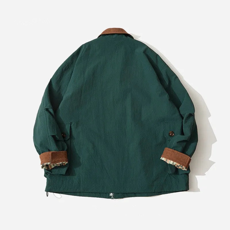 Green casual polyester jacket for men and women with side seam pockets on a hanger