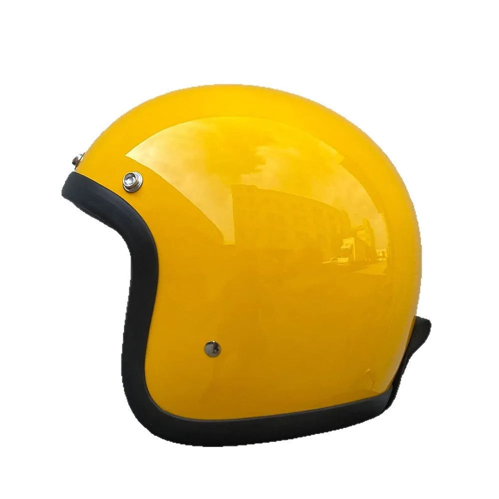 Retro-style half motorcycle helmet in fibreglass, shown in a cement grey colour option.