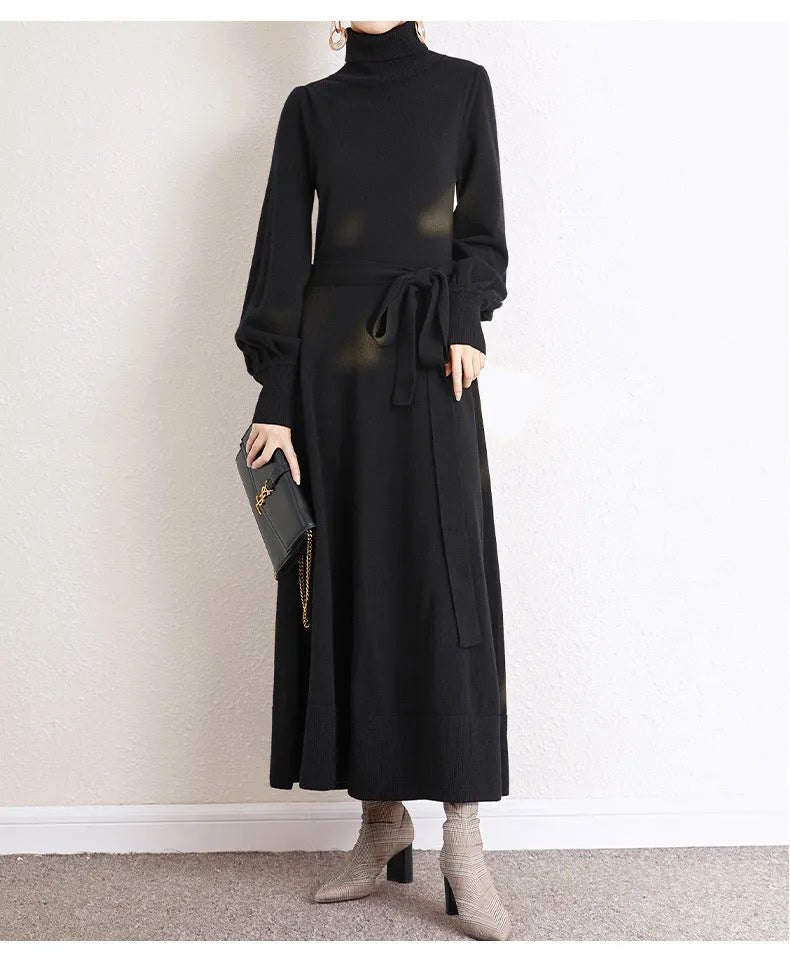 Rose red knit dress with a turtleneck collar, long sleeves, an elastic waist, and a loose big-hemmed midi skirt.