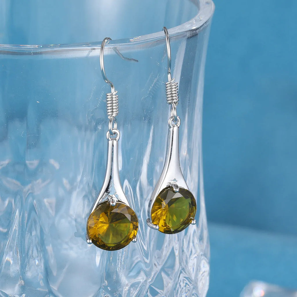Olive green topaz colour drop-shaped earrings with minimalist retro style design