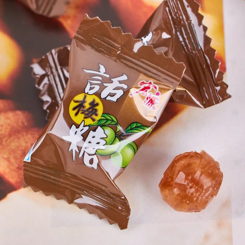 Three bags of hard candy: plum sugar, guava, and tangerine peel flavours.