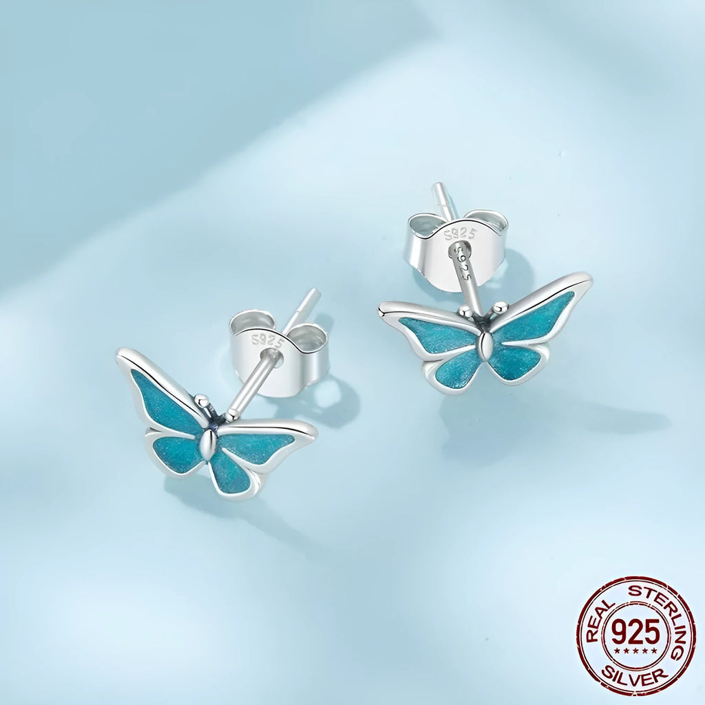 925 sterling silver blue butterfly small ear studs for women with dripping oil colour finish on white background