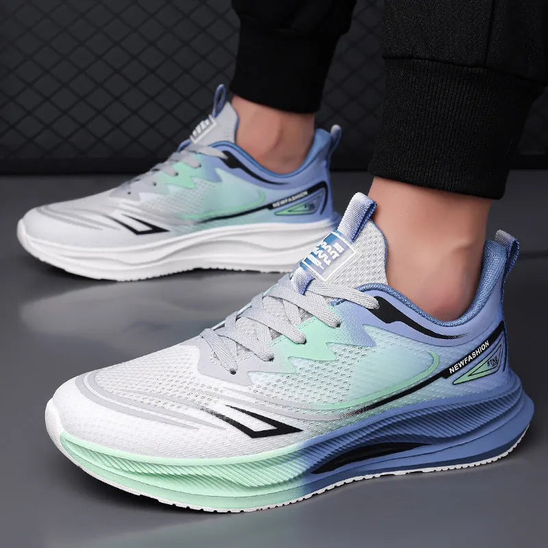 Men's low-top casual shoes in mesh with round toe and rubber sole, shown in black, blue, and grey-green colours.
