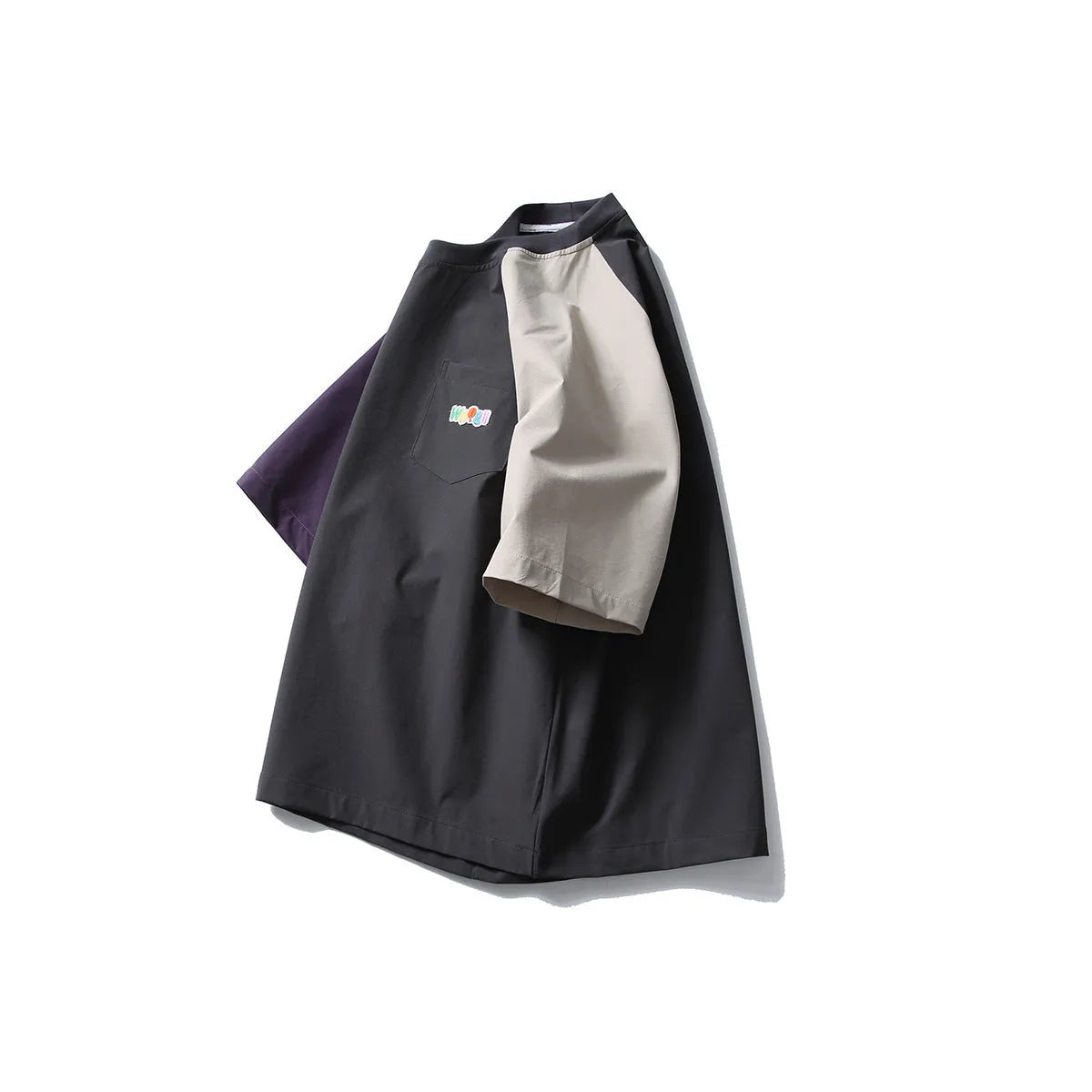 Dark grey men's loose-fit T-shirt with contrast colour raglan sleeves on a hanger.