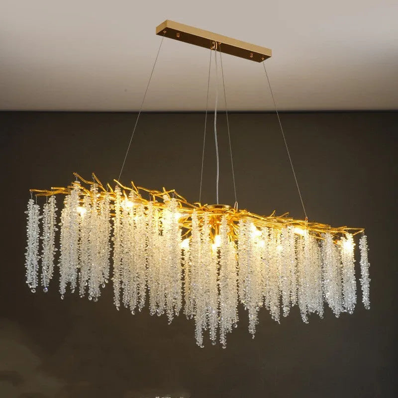 Modern crystal LED chandelier with adjustable height in a light luxury style.