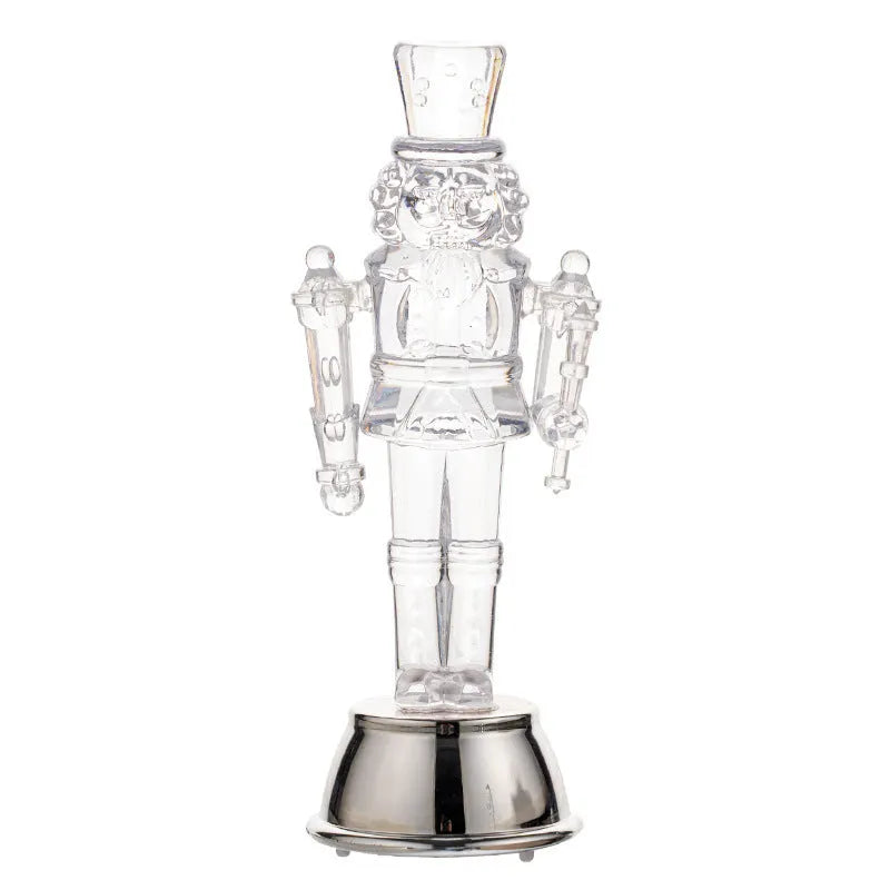 Transparent plastic walnut soldier nutcracker Christmas ornament in traditional design.