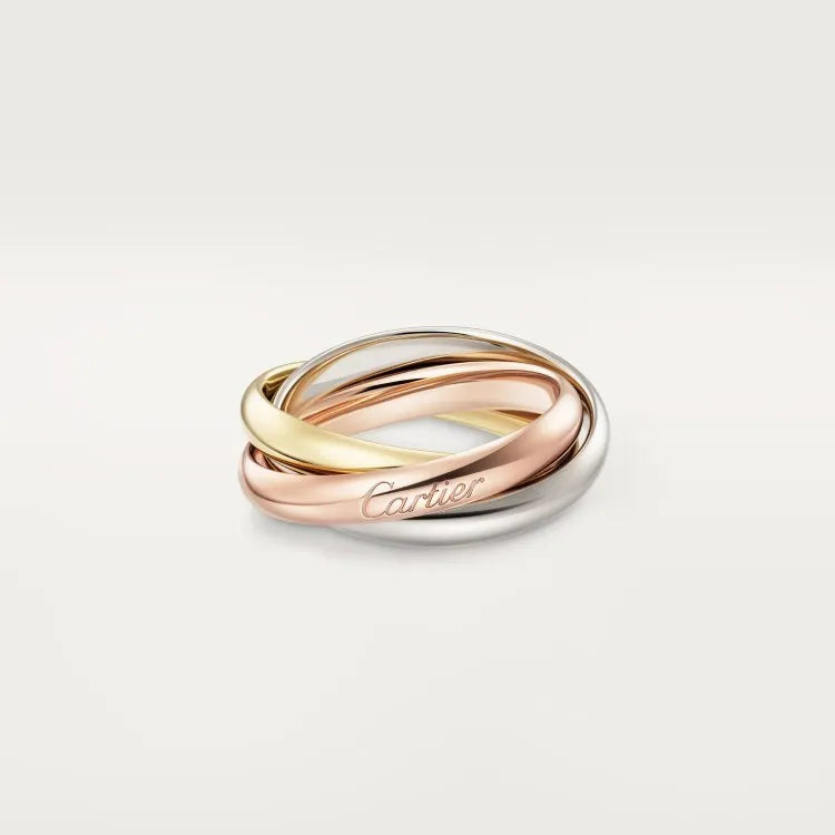 A silver couple ring with a full diamond band on a finger, showing geometric shape and personalised text engraving.