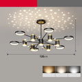 Black Nordic-style star-shaped iron pendant light chandelier with 13 lights hanging from a ceiling.