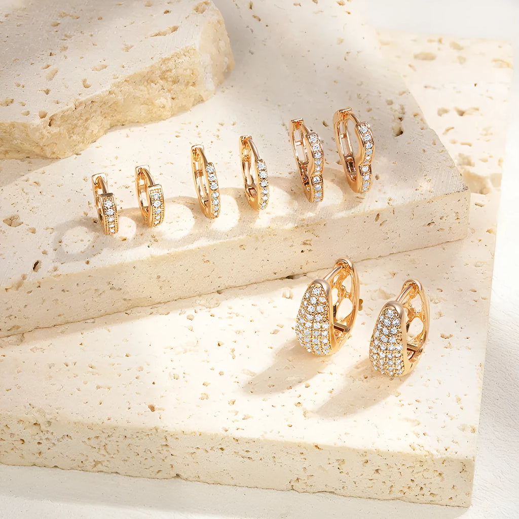 Gold-plated brass heart-shaped ear clip earrings with zircon gang drill elements in affordable luxury style