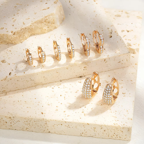 Gold-plated brass heart-shaped ear clip earrings with zircon gang drill elements in affordable luxury style