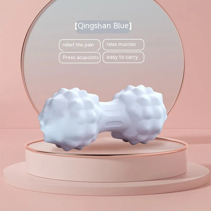 A 6cm diameter TPR foot massage ball shown in one of four colour options: pink, blue, green, or purple.