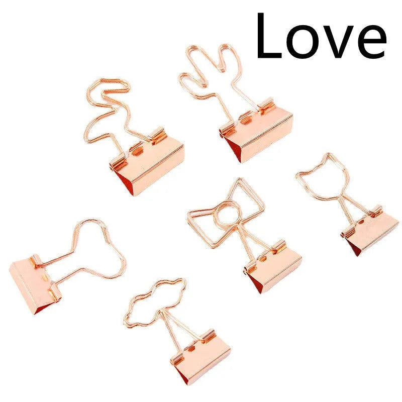 Gold plated metal office clip with decorative long tail design showing flamingo, love, clouds, cat, and cactus motif options