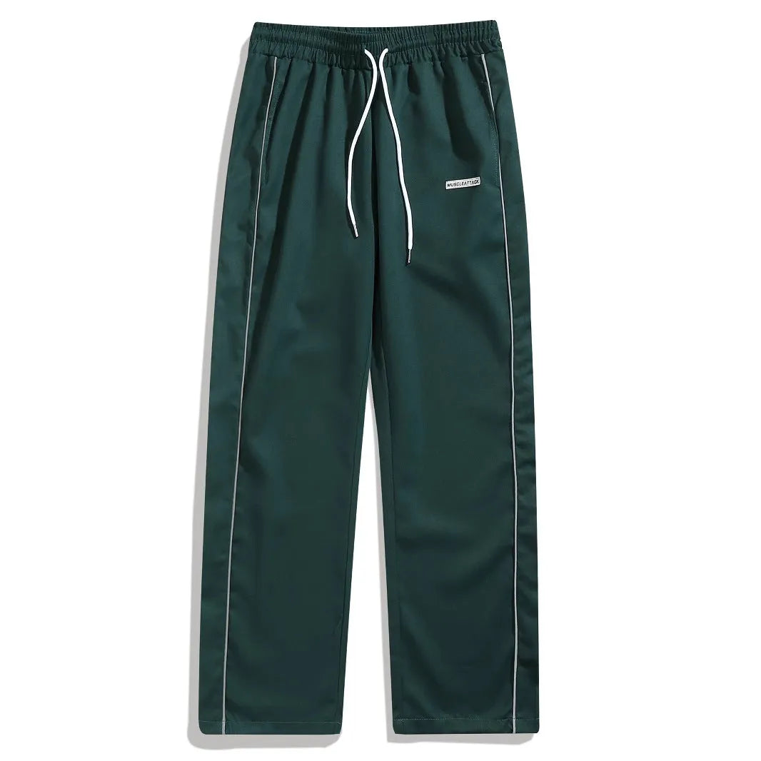 Men's loose fit polyester cargo trousers with side pockets in black, navy blue, and dark green