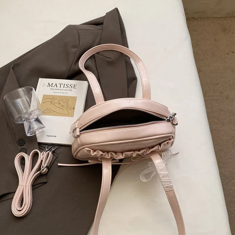 Women's bandage texture bow handbag in PU leather with shoulder strap and phone compartment