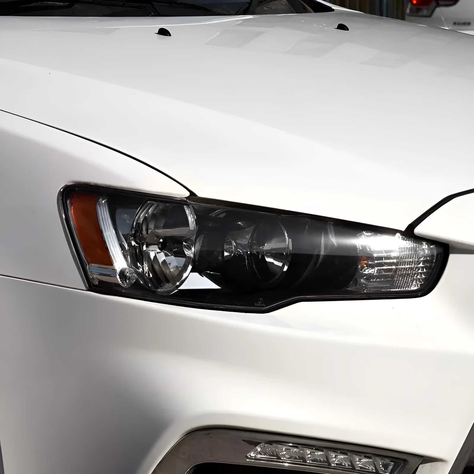 Transparent plastic headlight housing cover for vehicle replacement measuring 50x30x20mm