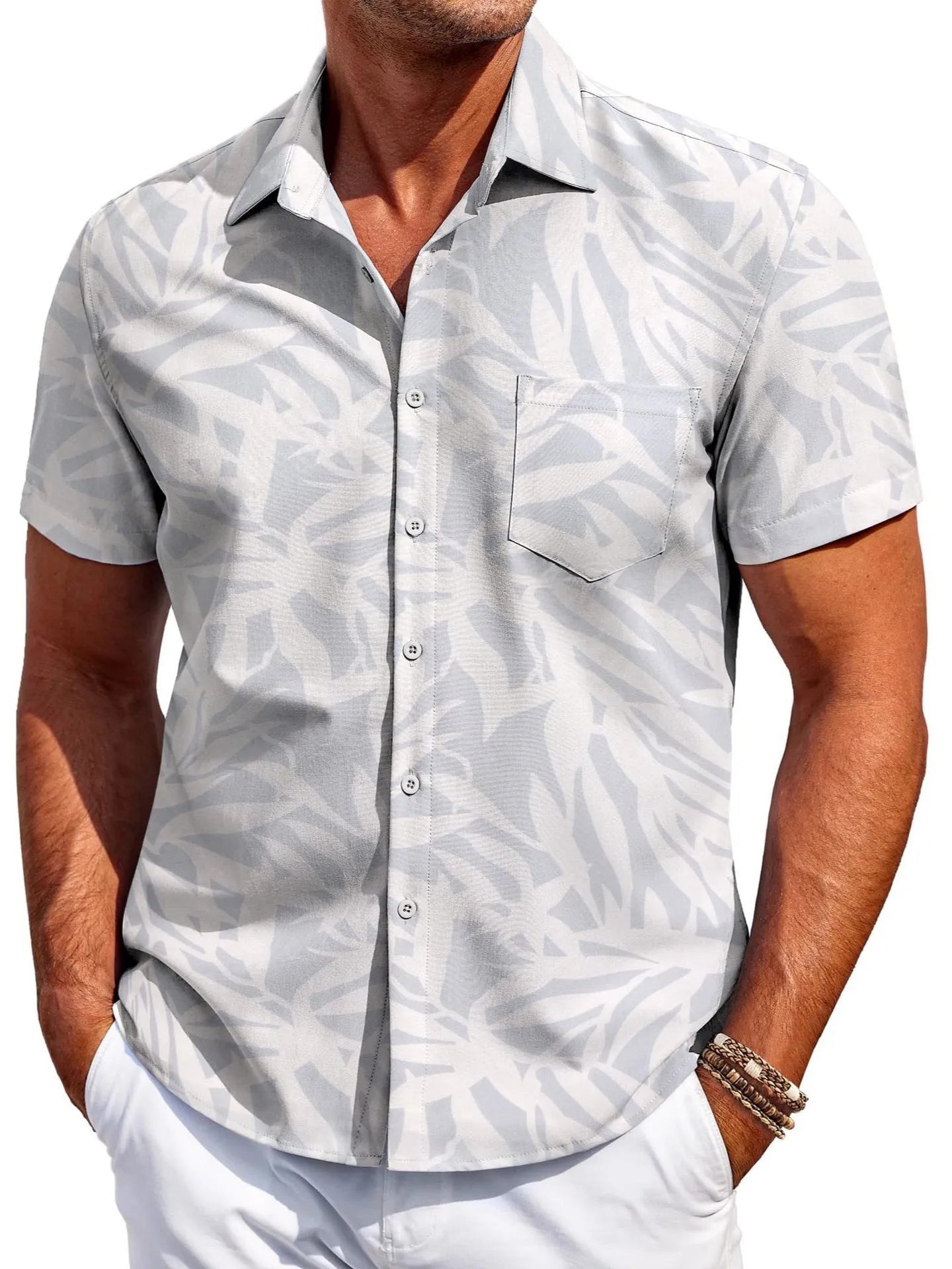 Man wearing a slim fit Hawaiian pattern short sleeve shirt in elastic polyester fabric.