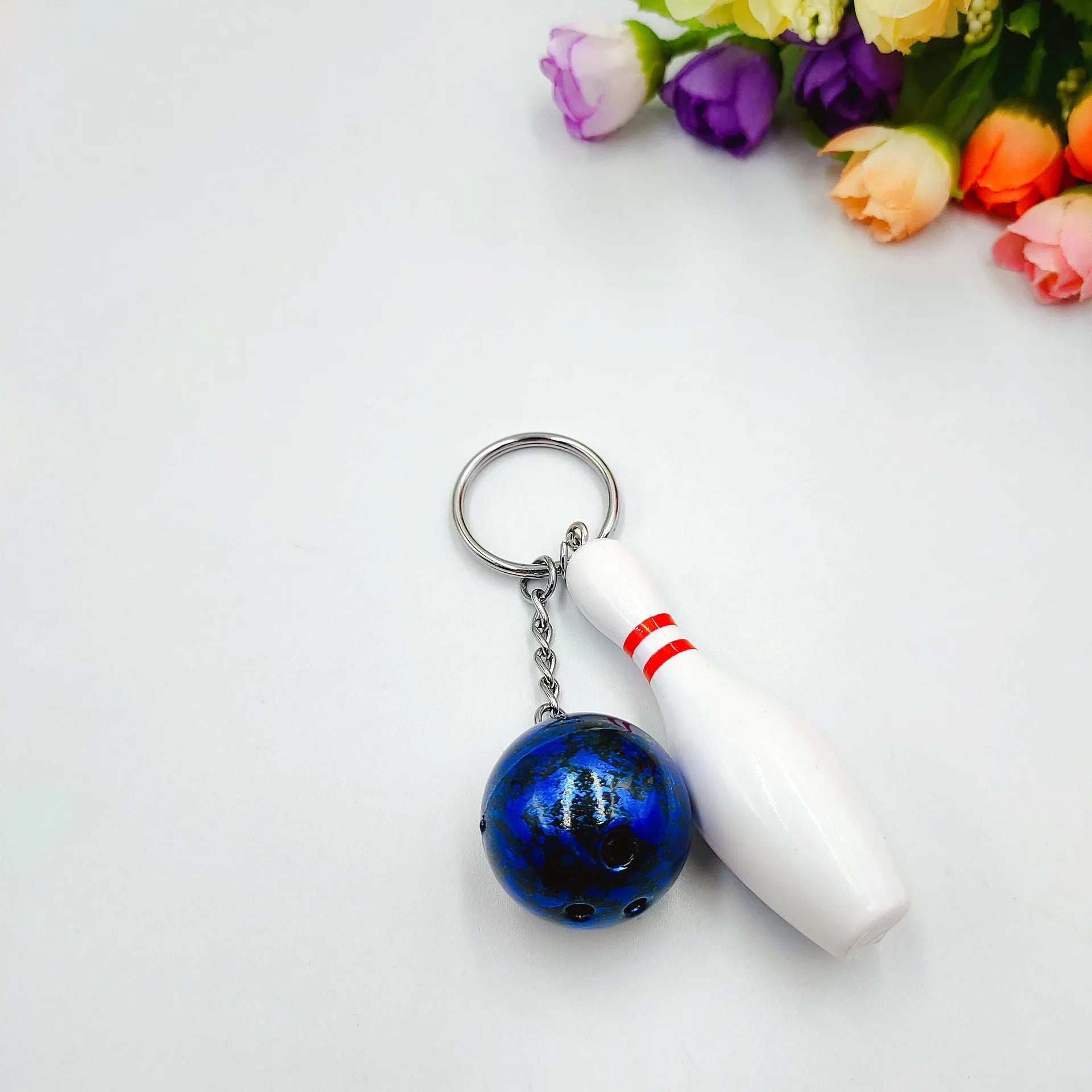 Mini bowling simulation keychain pendant in PVC metal available in four colours