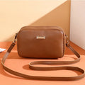 Women's solid colour PU shoulder bag with a three-dimensional pocket and horizontal square shape.